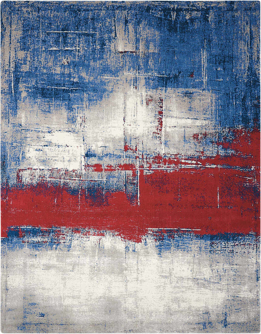 Close-up of the Nourison Twilight Multicolor Area Rug. Abstract design with blue, red, and gray tones.
