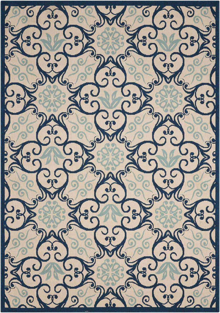 Close-up of the Nourison Caribbean Ivory Navy rug featuring a contemporary floral and scroll pattern.