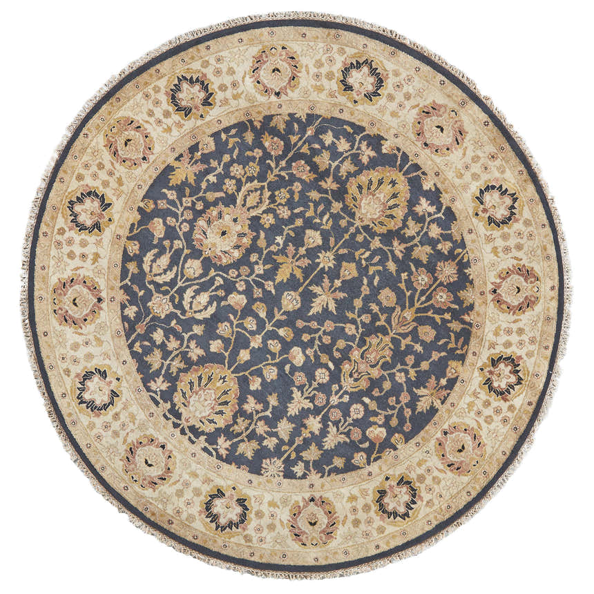 Close-up of round Feizy Drake rug. Black center with gold floral pattern, light border, and fringe. Traditional style. Design-Round