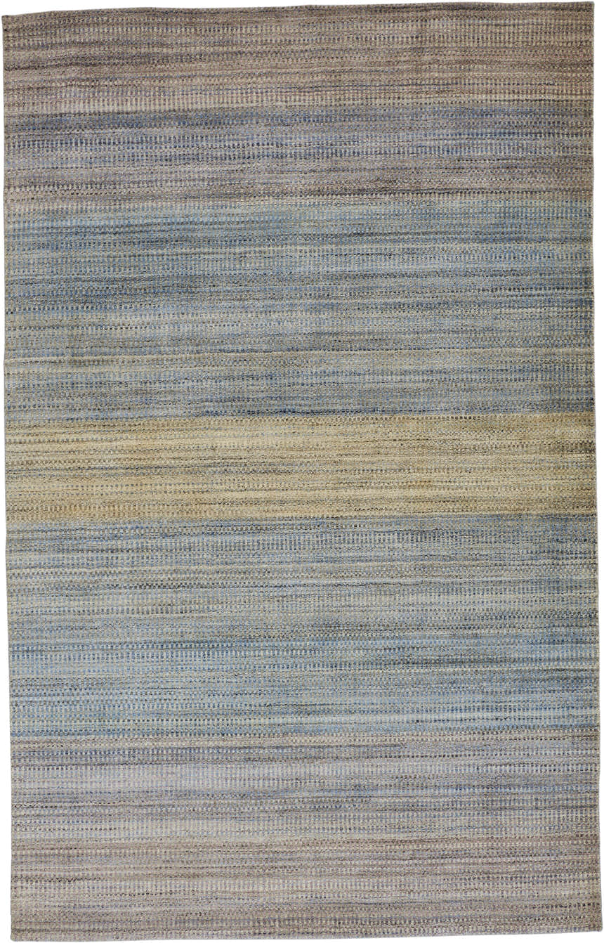 Close-up of Feizy Milan blue, purple, and tan area rug. Gradient ombre design, hand woven wool and viscose texture. Design-Rectangle