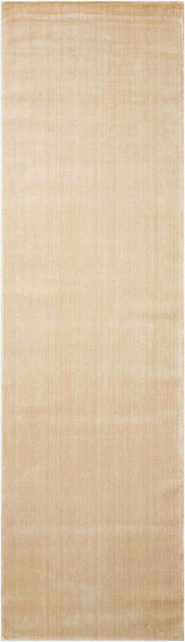 Close-up of the Oyster Nourison Starlight rug. The rug is a solid, light beige color with a subtle texture.