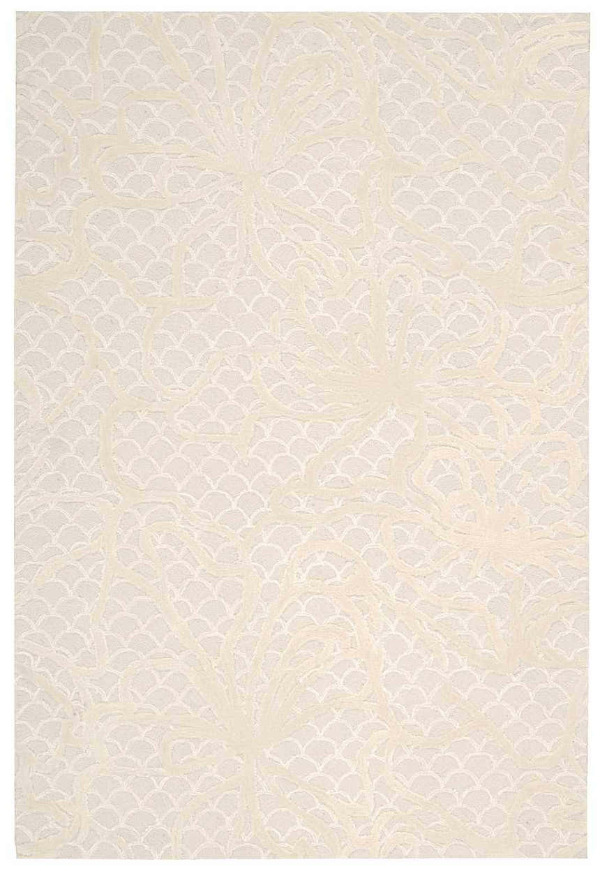 Close-up of the Nourison Escalade Spa Indoor Area Rug. Creamy floral design on a textured, scalloped background. Handmade rug.