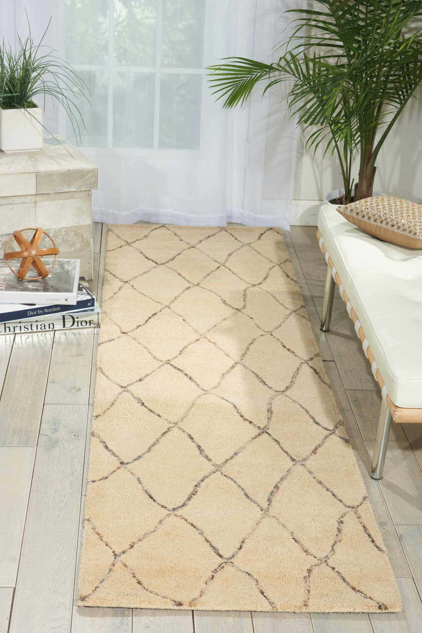 Light-filled room with Barclay Butera Intermix Sand runner rug, white bench, and potted plants for a serene, organic feel.