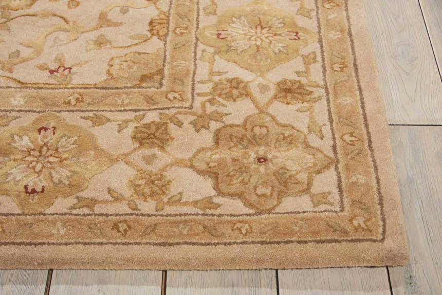Close up of the beige, handmade Nourison 3000 Persian Area Rug showing floral pattern and wool/silk texture.