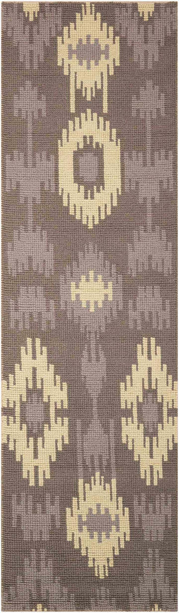 Close-up of Barclay Butera Prism Pebble rug. Handmade wool rug with geometric pebble and ivory pattern.