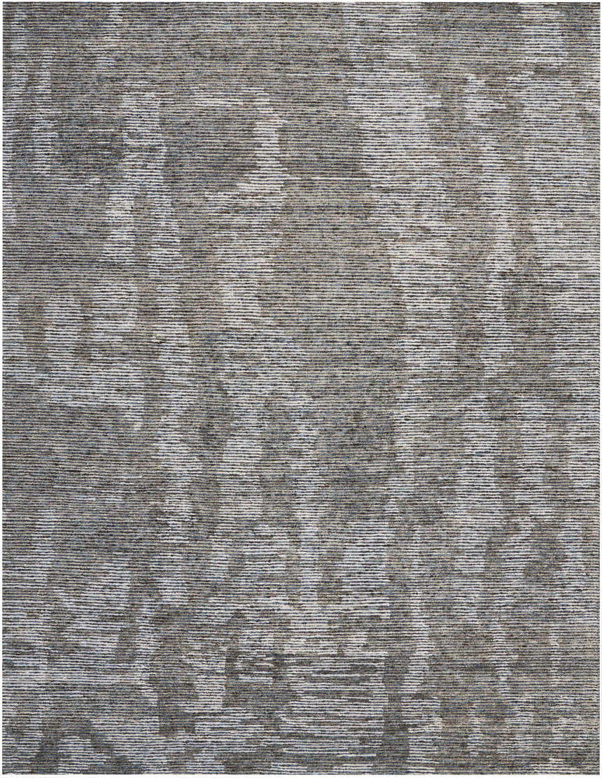 Close up of the Nourison Ellora Slate rug. Taupe, horizontal striations with a subtle, abstract pattern. Handmade rayon rug.