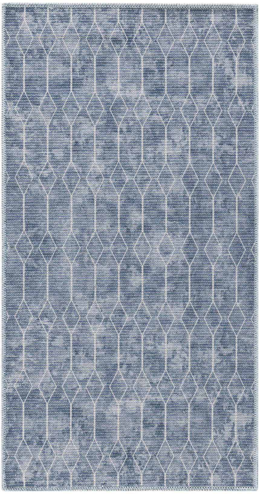 Close-up of Nourison New Concept Blue rug. Modern diamond pattern, light blue tones, washable rug texture.