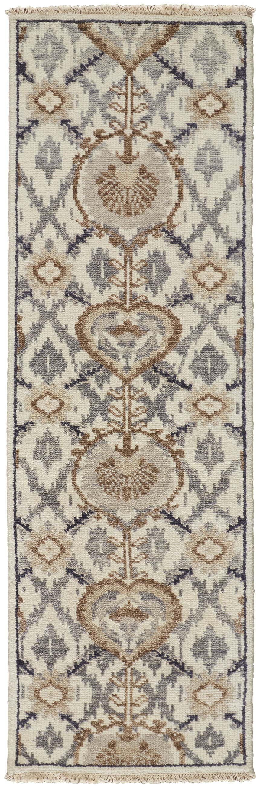 Close-up of Feizy Beall Traditional Oriental rug. Ivory, gray and taupe wool rug with hand-knotted construction. Design-Runner