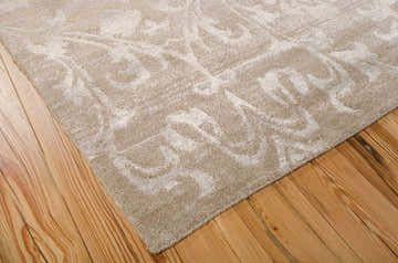 Close-up of a Nourison Silk Shadows Light Gold Vintage rug showing the texture and pattern.