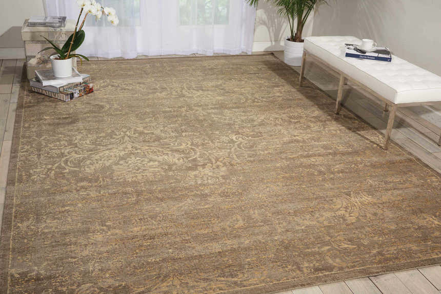 Light and airy room with a Nourison Silken Allure Mushroom Persian rug, white bench, sheer curtains, and wood floors.