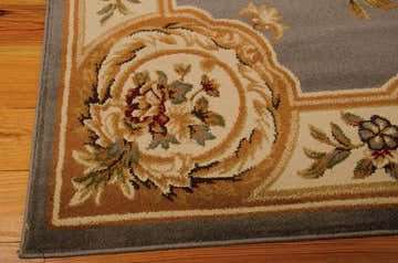 Close-up of the Nourison Paramount Grey Blue Vintage rug showing floral pattern and texture.