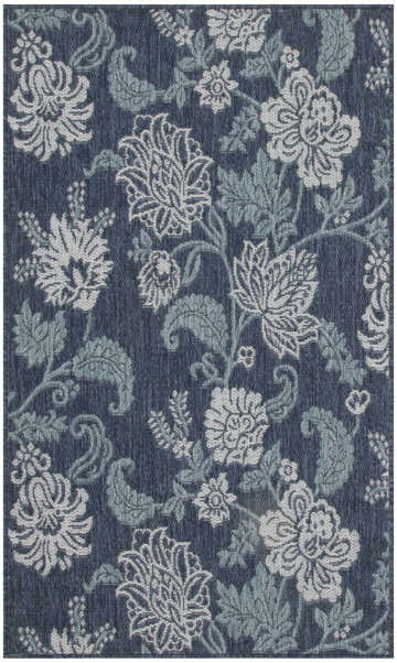 Close-up of the Nourison Garden Oasis Navy Tropical Area Rug featuring a floral and paisley pattern.