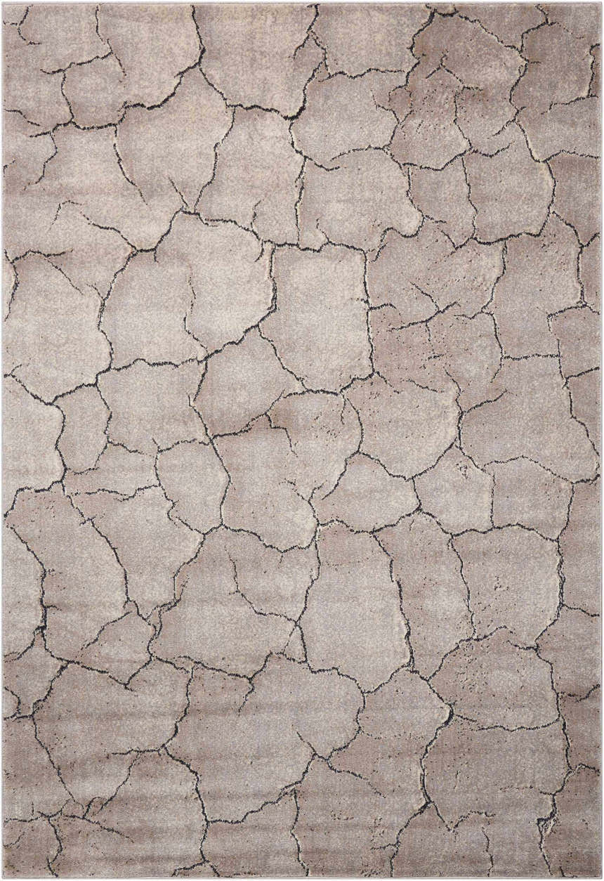 Close-up of Nourison Utopia Granite rug; gray with a unique cracked earth pattern and soft, subtle texture.