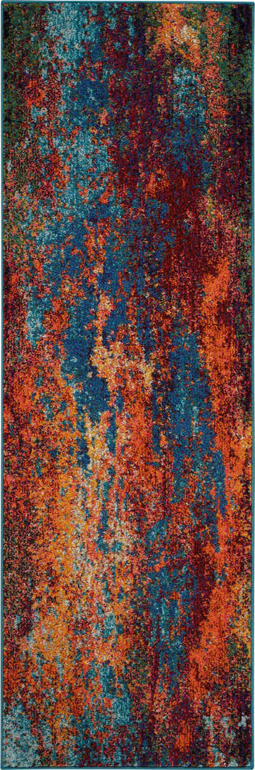 Close-up of the Nourison Celestial Atlantic Rug, featuring a vibrant abstract pattern in shades of blue, orange, and burgundy.