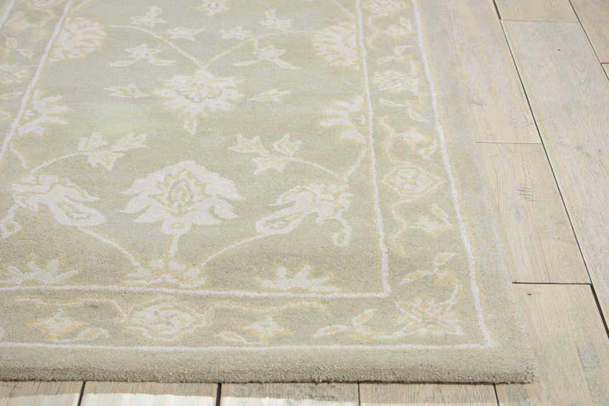 Close up of the Nourison Zephyr Silver rug showing wool texture and floral pattern.
