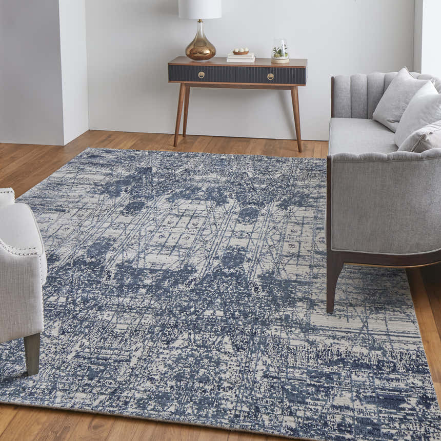 Living room with gray sofa and Feizy Eastfield blue and ivory abstract rug. Roomscene-Rectangle