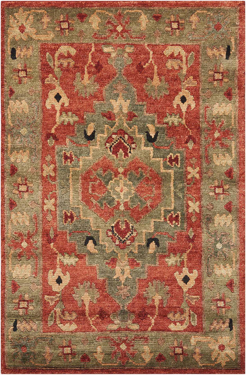 Close-up of the Nourison Tahoe Rust rug showcasing its traditional floral pattern in rust, green, and beige wool.