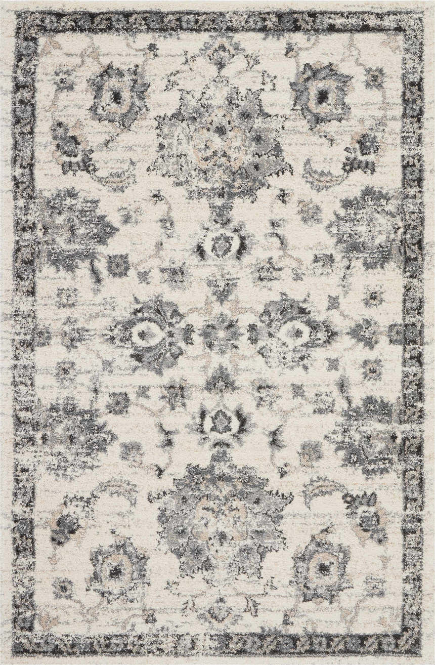 Close-up of Nourison Fusion Cream Grey Vintage Area Rug featuring a floral pattern and distressed border.