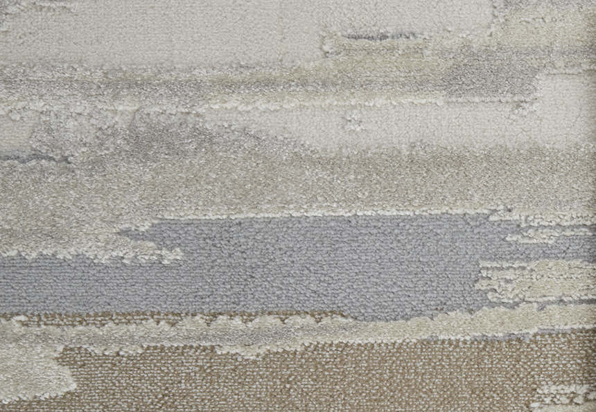 Close-up of the Feizy Vancouver rug, showcasing its ivory, tan, and brown abstract pattern and textured weave. Texture