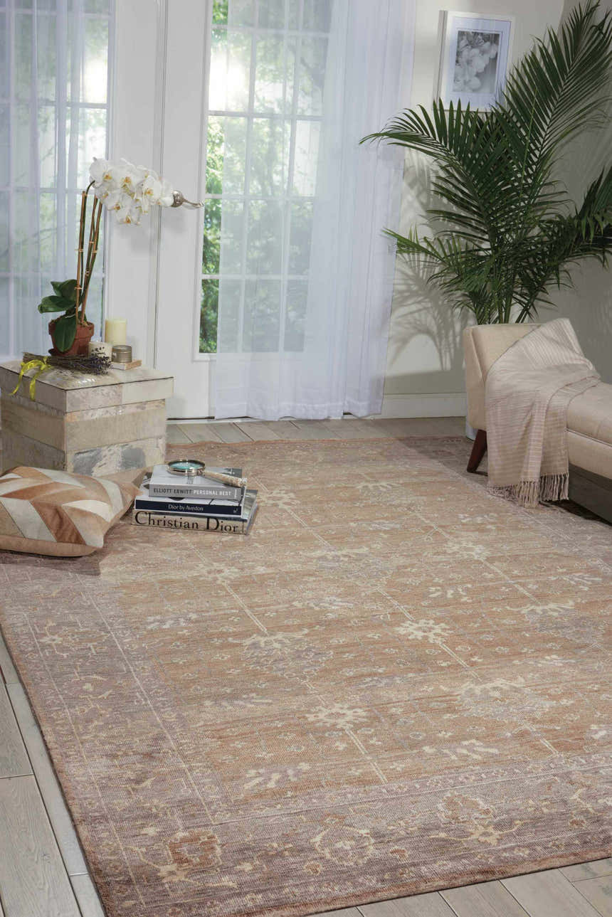 Light-filled room with a vintage Nourison Aldora Pewter rug, chaise lounge, and neutral decor.