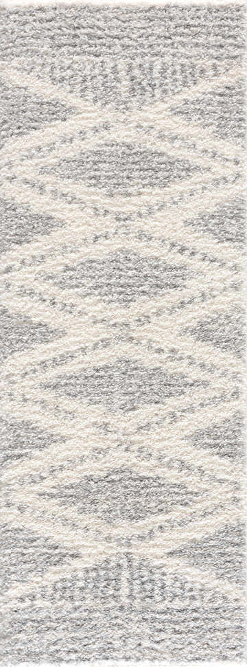 Close-up of a Trunding Plush Area Rug in Gray. Shag rug with a geometric pattern and cream and gray colors. Design-Runner-2773