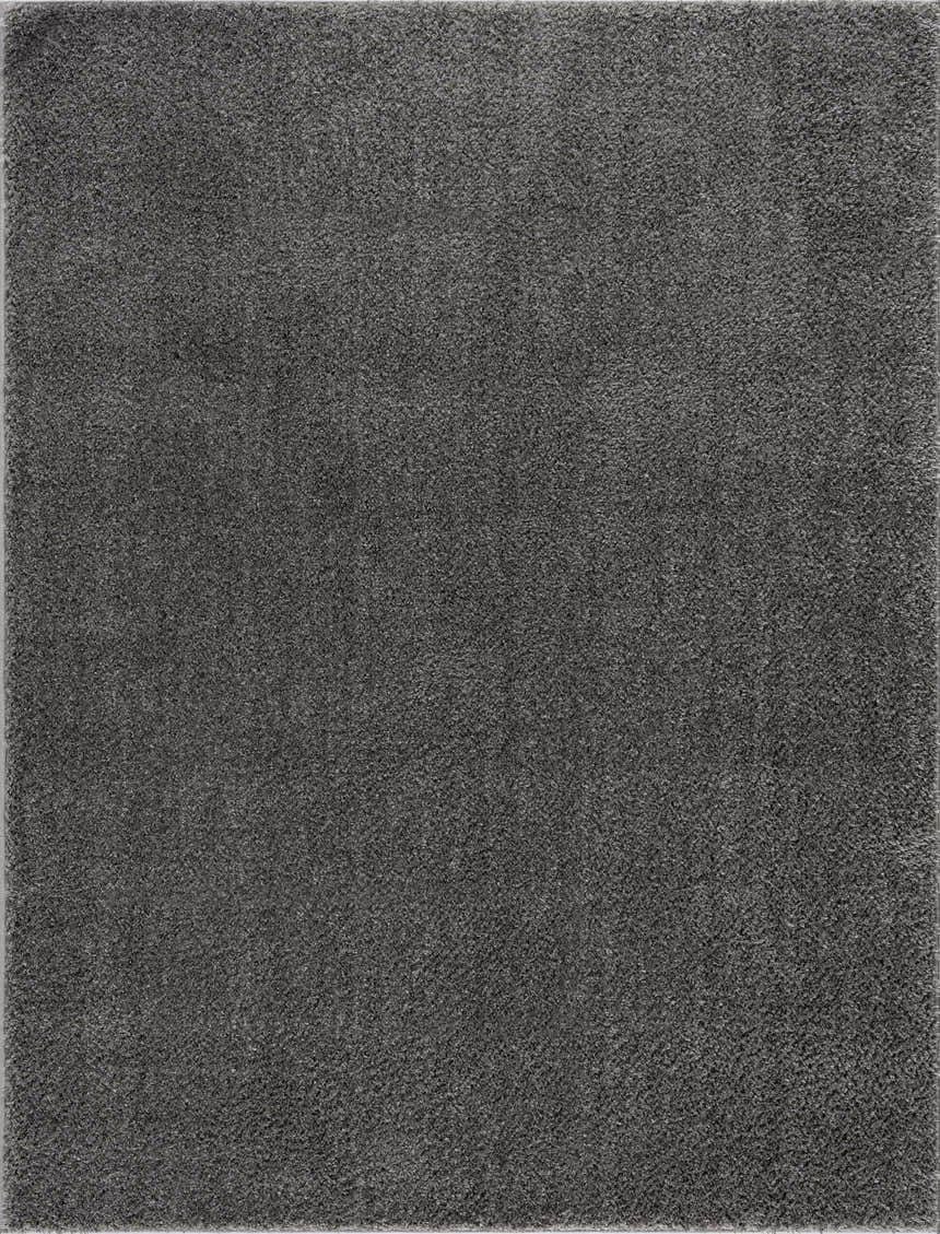 Close-up of the Judy Solid Dark Gray Washable Shag Rug, showing its soft texture and neutral gray color. Design-Rectangle