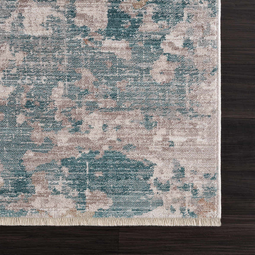 Close-up of the Danlugan Area Rug showing its charcoal, cream, and brown contemporary pattern and soft texture. Swatch