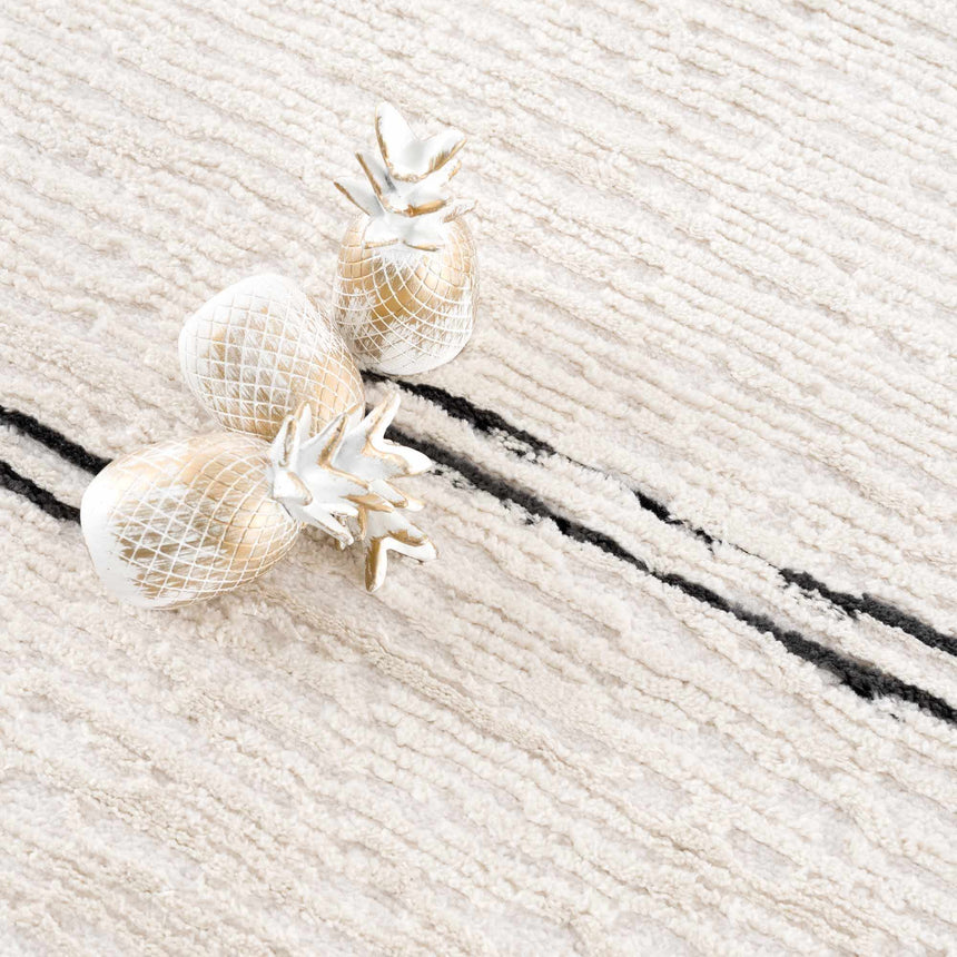 Riad Black Striped White Rug with Tassels