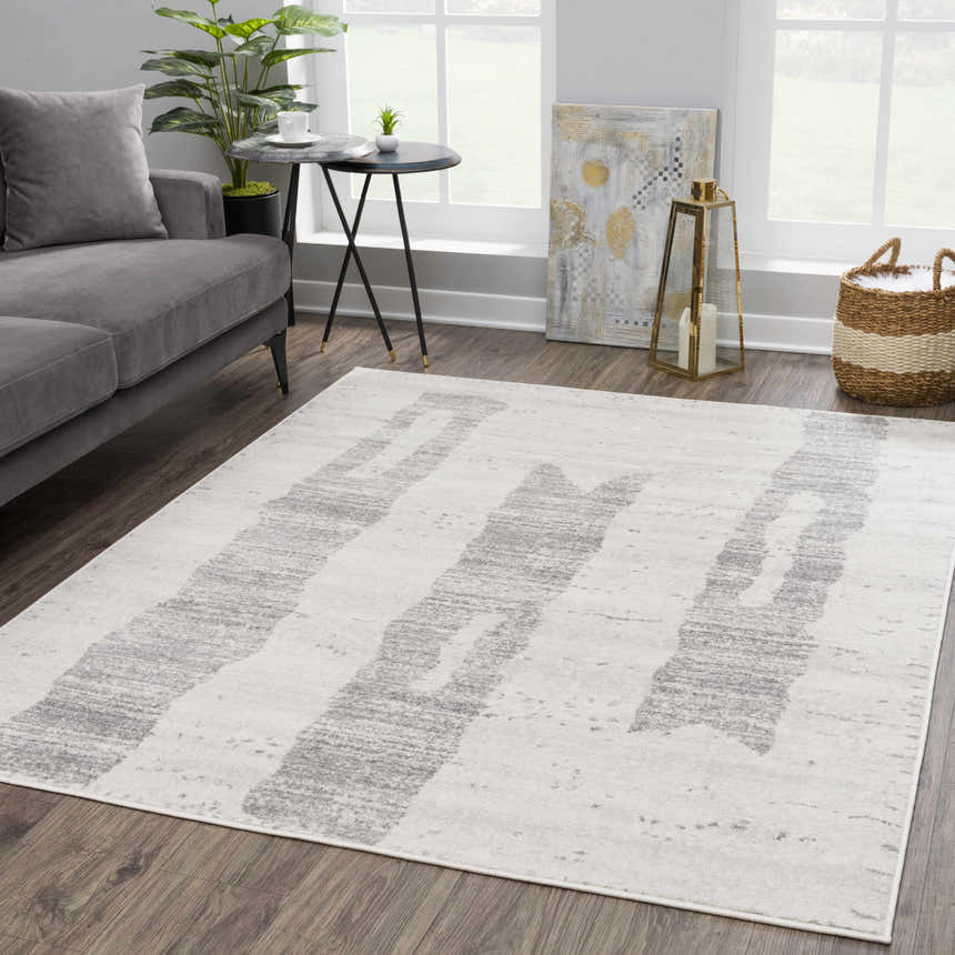 Living room scene with gray sofa and Tigria Ivory 2316 Area Rug. Contemporary style with gray and ivory colors. Roomscene-Rectangle