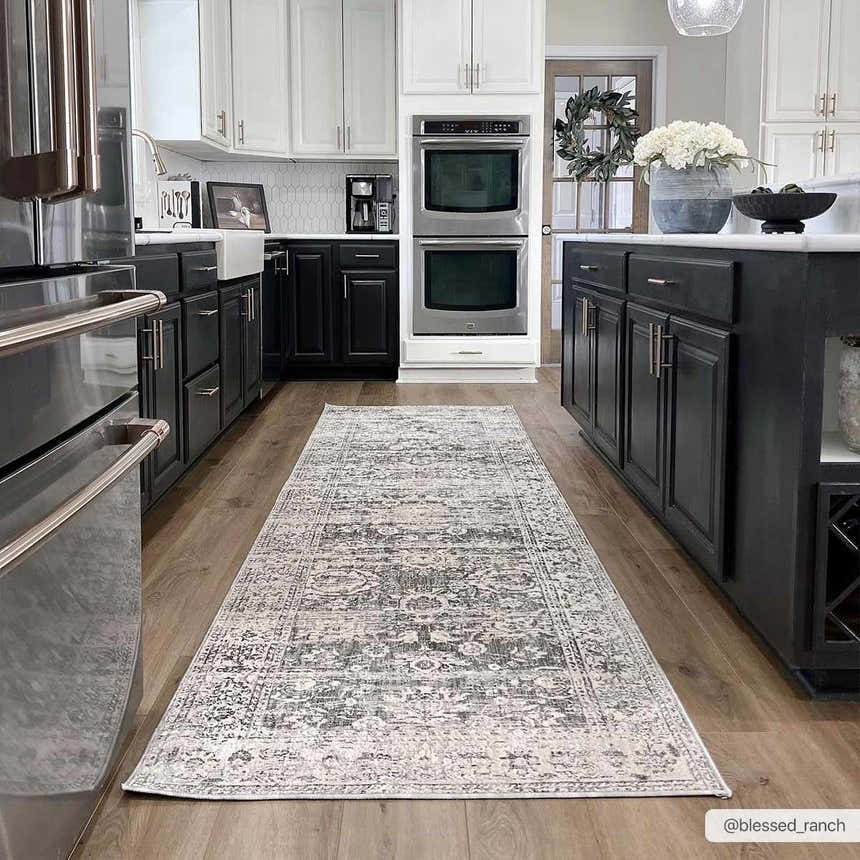 Farmhouse kitchen with the charcoal and cream Divisoria Area Rug adding warmth to the wood floors. Roomscene-Runner