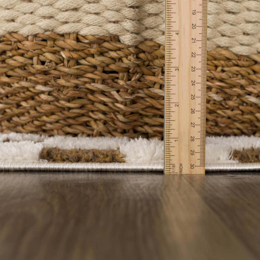 Close-up of the Lajos Brown Checkered Shag Rug showing its pile height, brown and beige checkered pattern, and soft texture. Pile