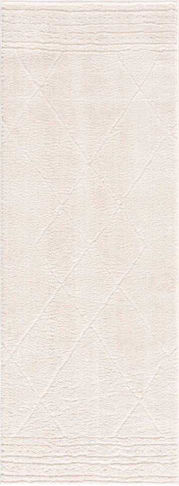 Close-up of the ivory Keone Area Rug featuring a subtle diamond pattern and textured design. Design-Runner-2773