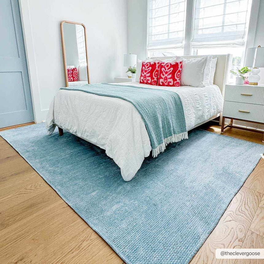 Isako Blue Solid Washable Area Rug - Clearance
