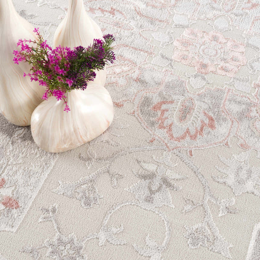 Close-up of Calum Pink Floral Thick Area Rug showing gray and pink floral traditional pattern and soft texture. Styleshot