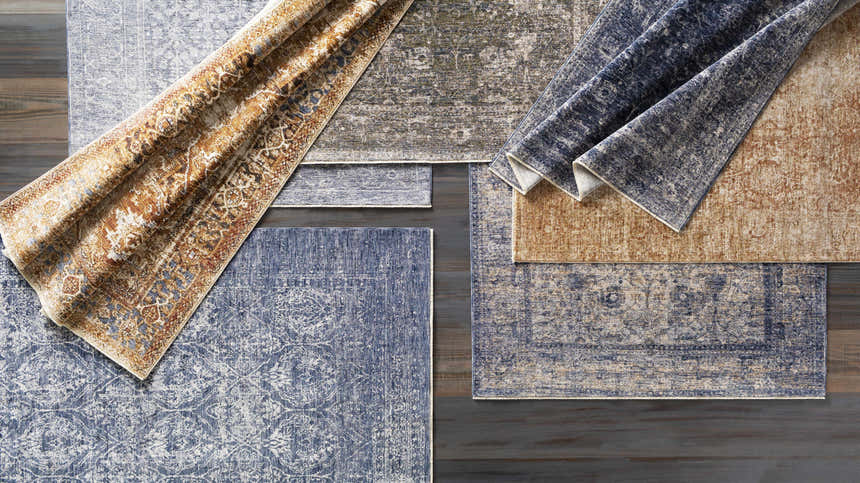 Overhead shot of Housatonic Area Rug - Clearance in denim, beige, navy, and olive colors. Traditional oriental rug patterns. Styleshot