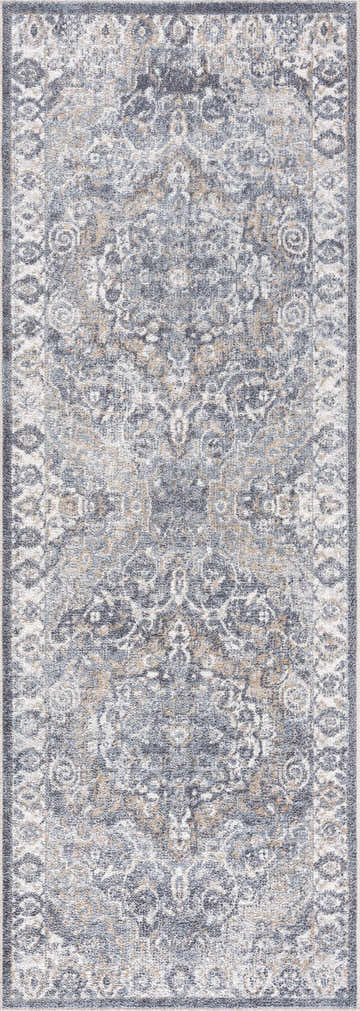 Close-up of the Aurum Blue Washable Area Rug showcasing its traditional charcoal, gray, and brown floral pattern. Design-Runner-2773