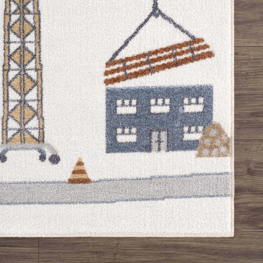 Close-up of the Olwen Washable Area Rug with a construction site design in blue, cream, and light gray. Swatch