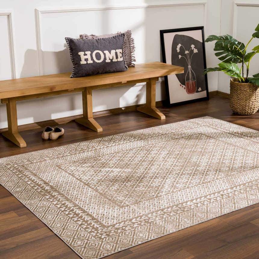 Entryway with a Caditaan Washable Area Rug in light beige and brown, wood bench, houseplant, and dark wood floors. Roomscene-Rectangle