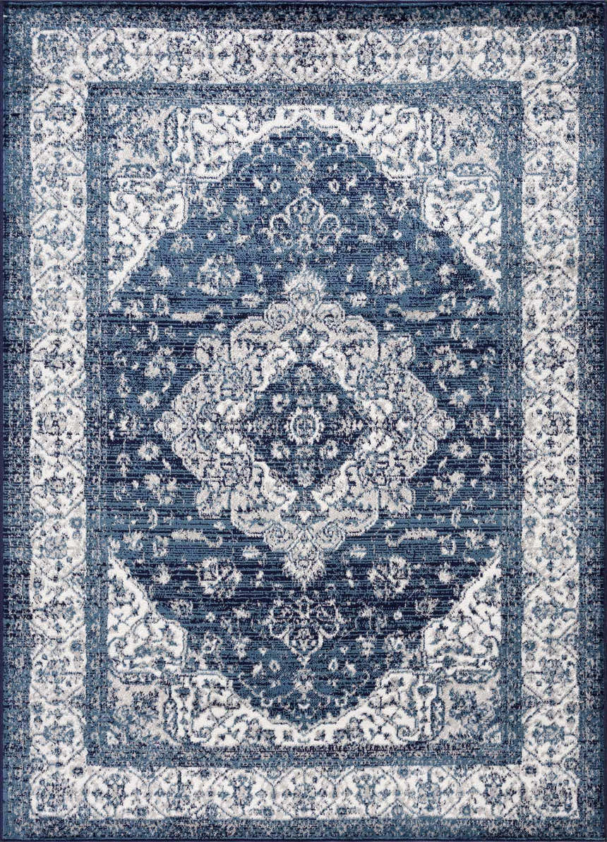 Close-up of the Billy Area Rug, a machine-woven rug with a blue and navy oriental design and traditional Persian pattern. Design-Rectangle-46