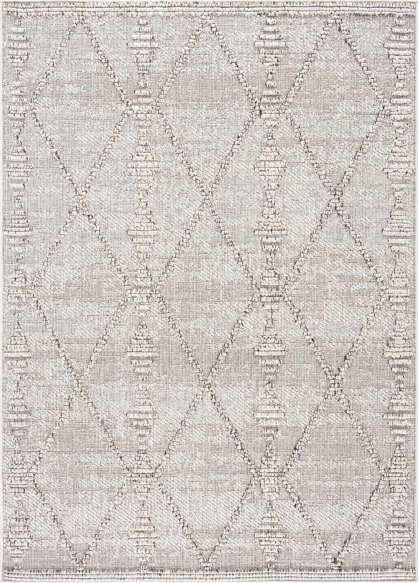 Close-up of Nyla Bone Indoor & Outdoor Rug. Neutral bone color with a diamond geometric pattern and woven texture. Design-Rectangle-46