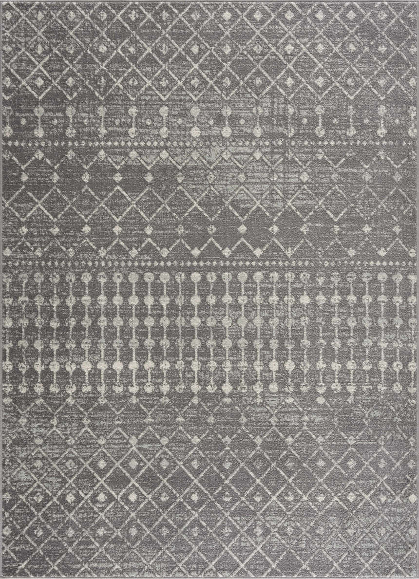 Close-up of the Marash KMRSH-4607 area rug. Dark gray rug with ivory geometric diamond and dotted line pattern. Design-Rectangle-23