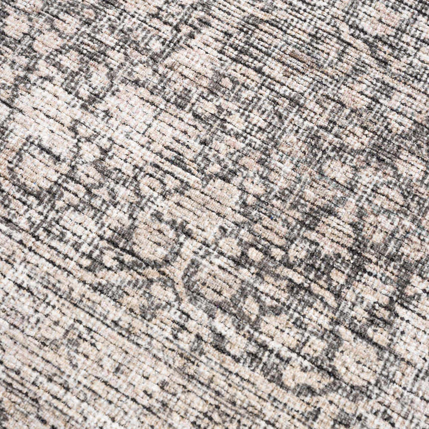 Close-up of the Odele Washable Area Rug, medium gray farmhouse style with a traditional pattern and soft chenille texture. Texture
