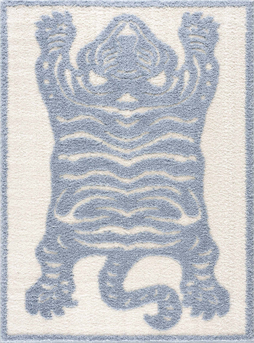 Close-up of the Zane Light Blue Tibetan Tiger Area Rug, featuring a shaggy texture and animal design. Design-Rectangle-46