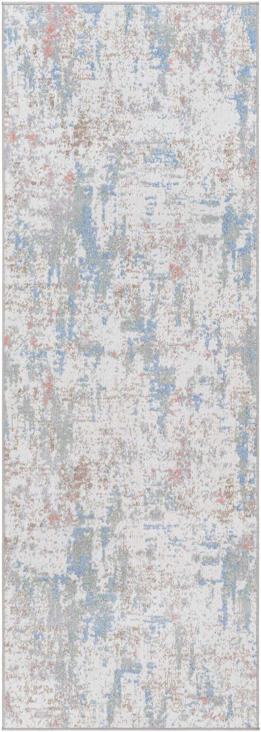 Close-up of the Ahava Washable Area Rug. Features a distressed abstract pattern in white, blue, gray, and coral tones. Design-Runner-2773