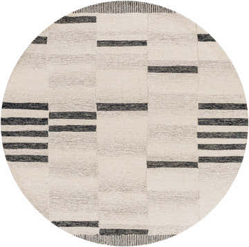 Close-up of the round Aibonito rug with beige and black geometric stripes. Hand-tufted wool texture. Design-Round-6