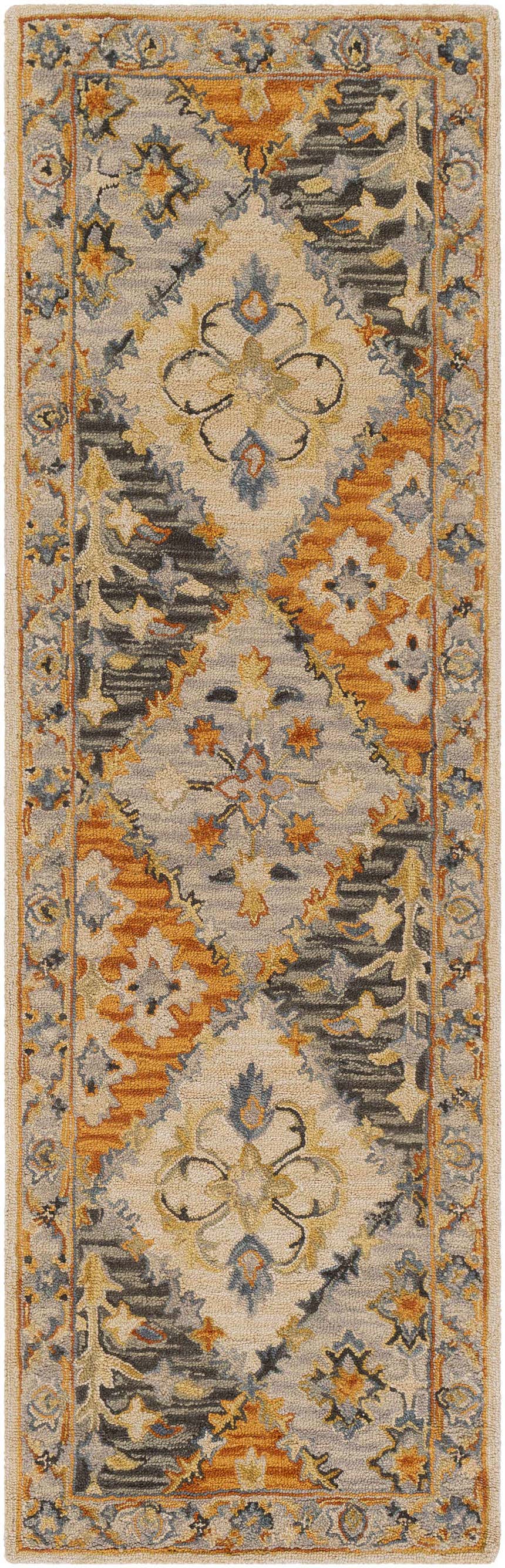 Close-up of the hand-tufted Alliance Area Rug. Features a floral and geometric pattern in beige, gray, blue, and orange. Design-Runner-268