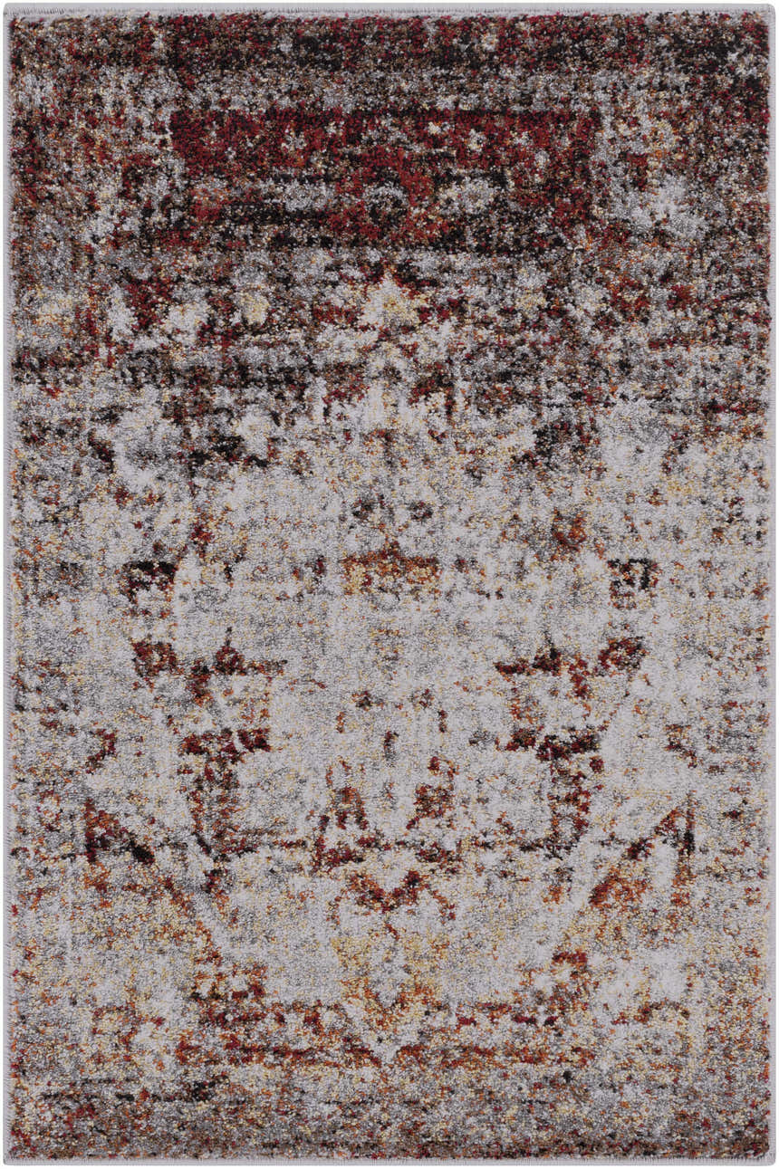 Close-up of the Analisa Area Carpet, a vintage style rug in black, burgundy, gray, ivory, orange, and yellow. Design-Rectangle-23
