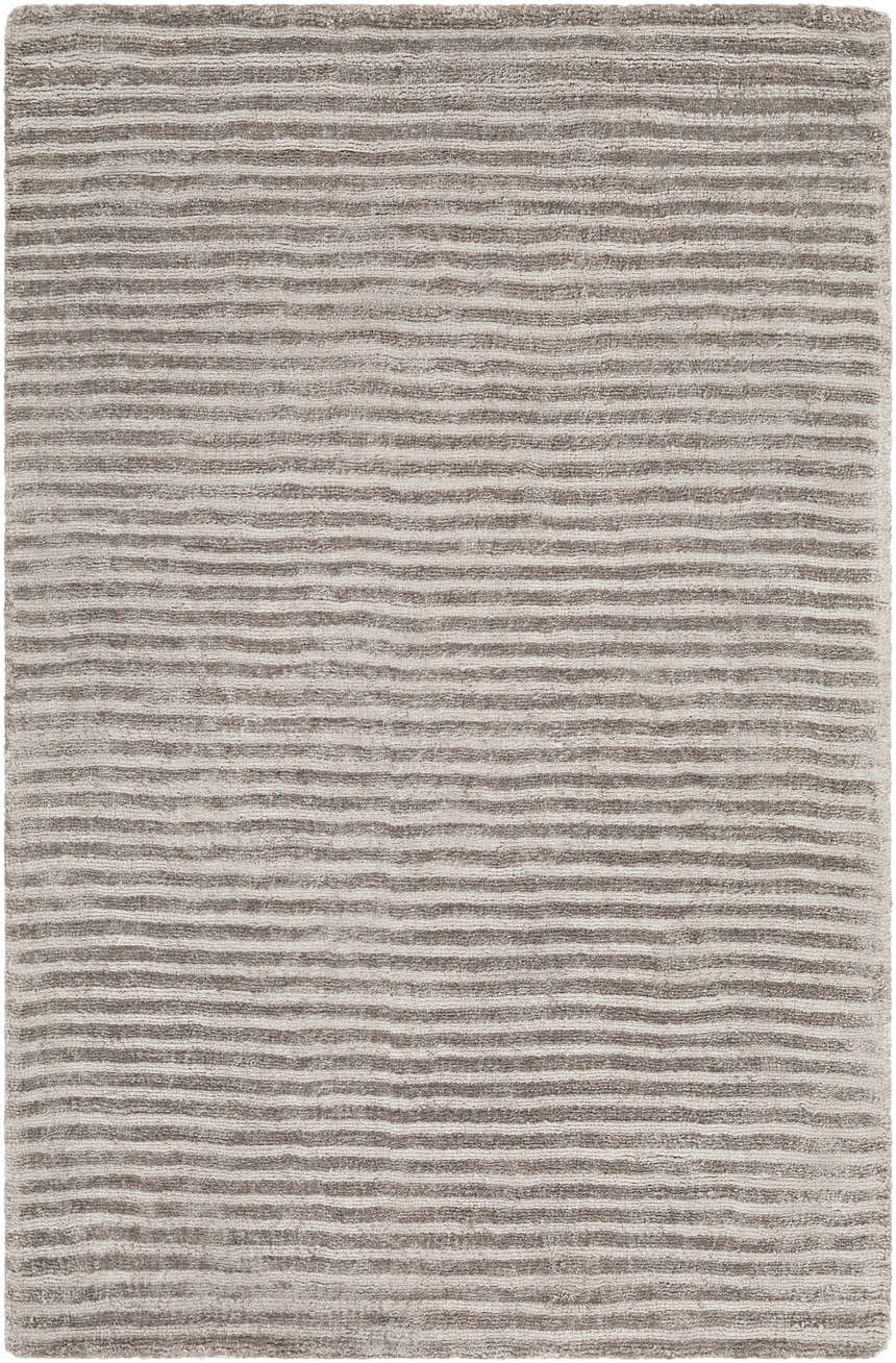 Close-up of the Angie Area Rug in charcoal, showing a hand-loomed striped design and soft viscose texture. Design-Rectangle-23