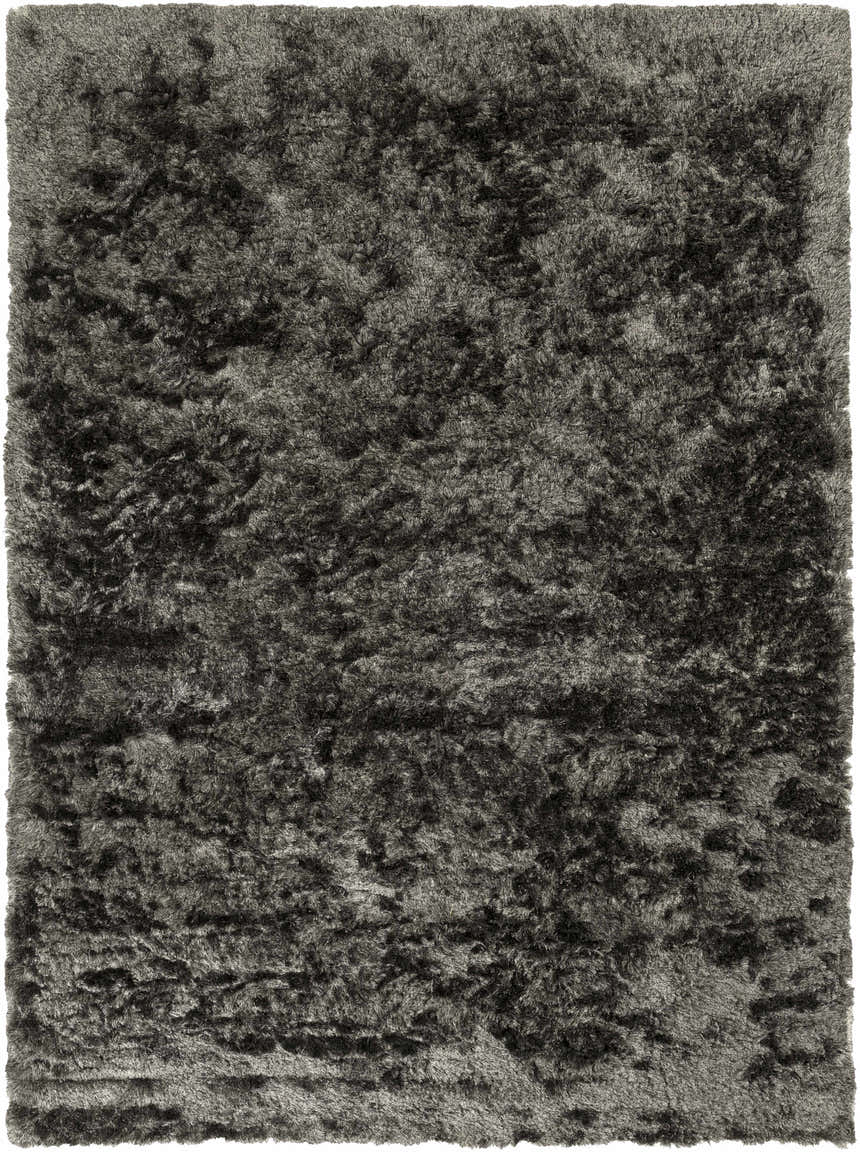 Close-up of the Ink Blue Auxier Area Rug. Contemporary shag rug with a hand-woven texture. Design-Rectangle-811