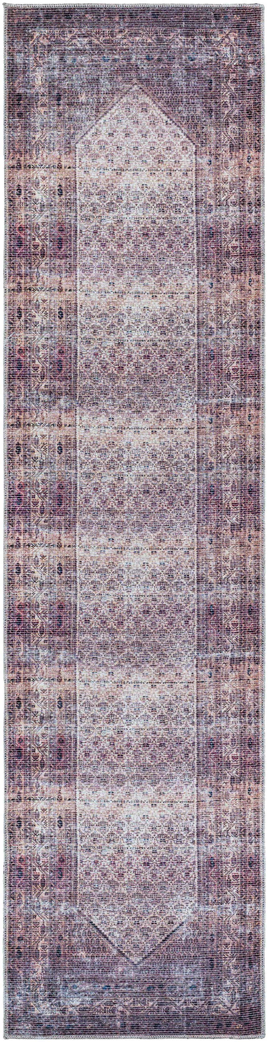 Close-up of the Dusty Pink Bagacay Distressed Washable Area Rug. Features cream, pink, and blue oriental-inspired patterns. Design-Runner-2710